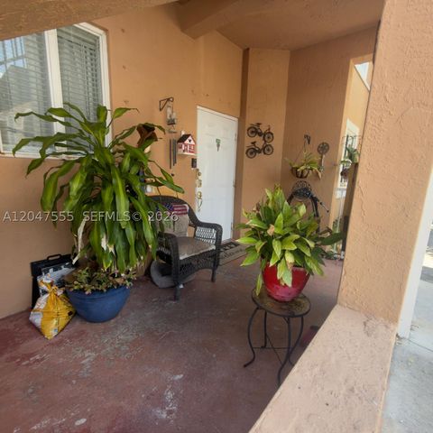 Tiny photo for 17820 NW 73rd Ave #103-1, Hialeah, FL 33015 (MLS # A12047555)
