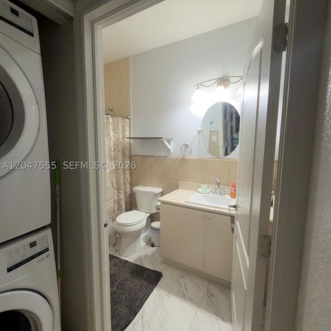Tiny photo for 17820 NW 73rd Ave #103-1, Hialeah, FL 33015 (MLS # A12047555)