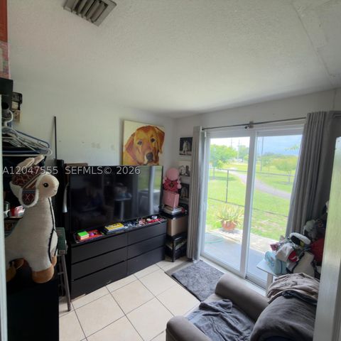 Tiny photo for 17820 NW 73rd Ave #103-1, Hialeah, FL 33015 (MLS # A12047555)