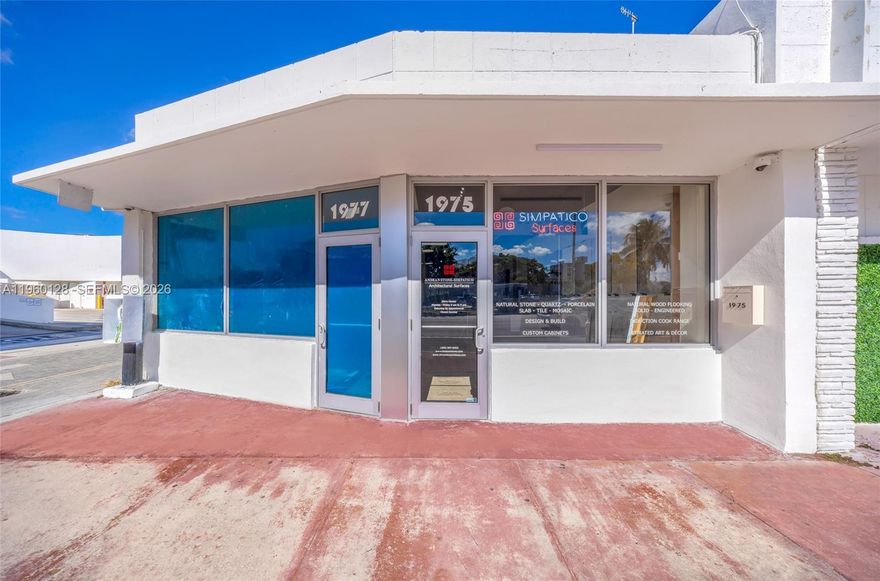 This 1,950 SF building in Normandy Isle, offered at $1,799,999, represents a fully modernized, low-CapEx acquisition with substantial immediate value. The property has been extensively hardened and upgraded, featuring a New Roof (2026), new impact doors and windows (2025), fresh exterior paint (2025), and a designer bathroom finished in Italian porcelain (2025). These specific improvements offer an investor significant long-term savings on insurance premiums and maintenance while providing a "plug-and-play" environment that bypasses the difficult Miami Beach permitting process. The asset is divided into two 975 SF bays; one is a meticulously finished luxury showroom, while the second offers the flexibility to be delivered "as-is" or renovated by the owner to the same high-end standard depending on the offer.
The location value is driven by its position at the primary transit gateway between the mainland and the ocean, placing it at the epicenter of a massive residential renaissance. To the west, North Bay Village is being reshaped by ultra-luxury towers like Shoma Bay, the Continuum Club, and Pagani Residences, while the immediate area to the east is densifying with projects like 72 Park and Ella Miami Beach. For the investor, this concentration of high-net-worth inventory ensures a captive, affluent consumer base and guaranteed land value appreciation.