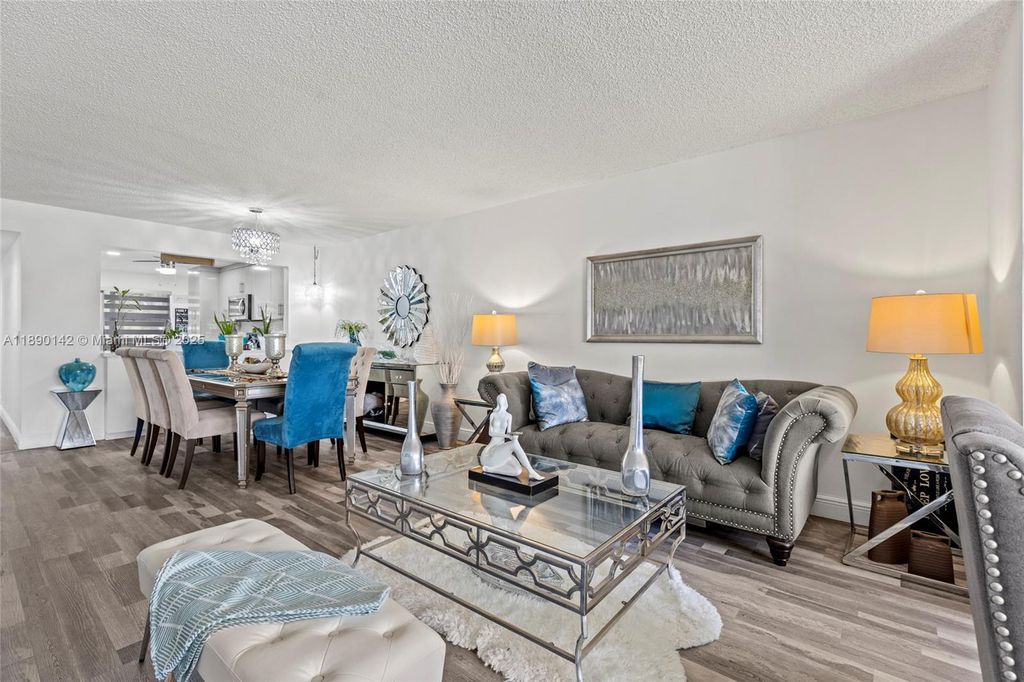 Photo of 10400 NW 30th Ct #202, Sunrise, FL 33322 (MLS # A11890142)