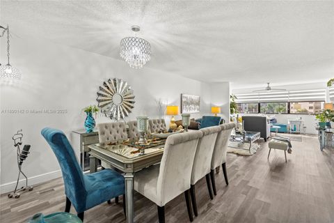 Photo of 10400 NW 30th Ct #202, Sunrise, FL 33322 (MLS # A11890142)