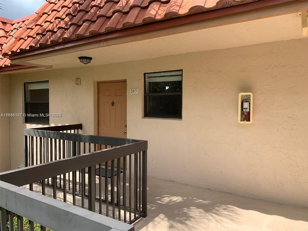 Photo of 15705 W Waterside Cir #203, Sunrise, FL 33326 (MLS # A11886227)