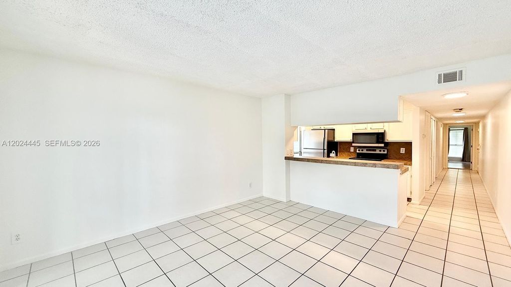 Photo of 278 Cypress Point Dr #278, Palm Beach Gardens, FL 33418 (MLS # A12024445)