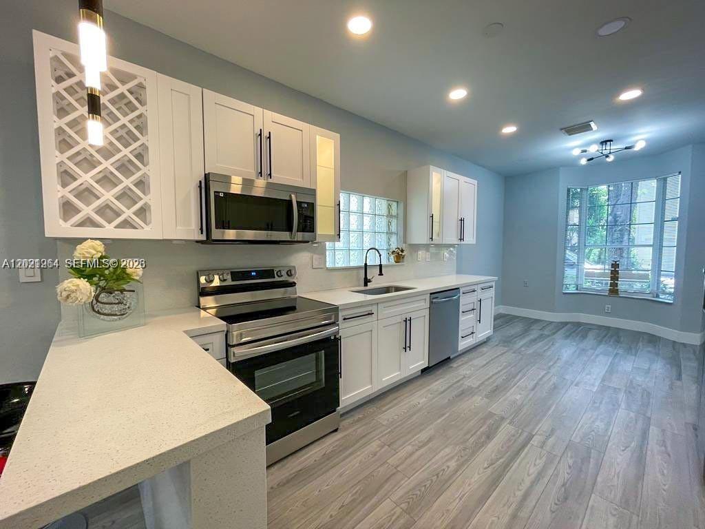 Photo of 1261 Hayes St, Hollywood, FL 33019 (MLS # A12021964)