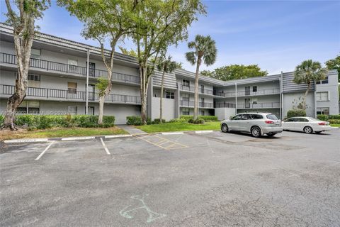 Photo of 9070 Lime Bay Blvd #110, Tamarac, FL 33321 (MLS # A12019802)