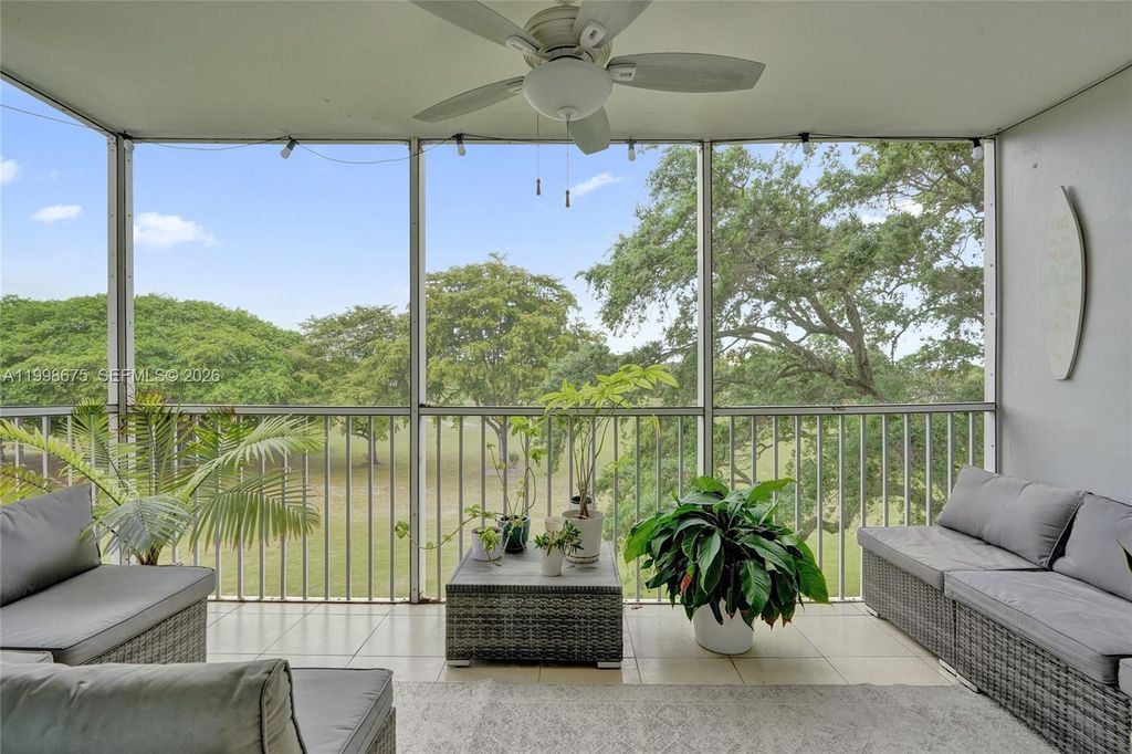 Photo of 2651 S Course Dr #410, Pompano Beach, FL 33069 (MLS # A11998675)