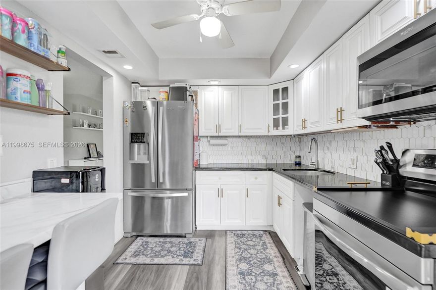 RARE 3-BEDROOM CORNER UNIT WITH GOLF VIEWS, MINUTES FROM THE BEACH, MOVE-IN READY AND LOW RISK HOA. Welcome to one of the best-value 3-bedroom condos in Palm Aire—a bright, spacious corner unit designed for easy South Florida living. Flooded with natural light, this 3BR/2BA home features an open layout, updated kitchen with stainless steel appliances, and a cozy living area that flows seamlessly to your private balcony overlooking the golf course. Major upgrades already handled for you: A/C replaced (2021), Special assessment PAID IN FULL, HOA with FULL RESERVES (rare and highly desirable). Enjoy peaceful mornings with golf course views and the convenience of being just 10 minutes from the beach, shopping, dining, and major highways. Located in a well-maintained community with strong financials, this is a perfect fit for: Full-time living, Seasonal retreat, and Low-maintenance investment. Opportunities like this in Palm Aire don’t last—especially 3-bedroom corner units at this price. Schedule your showing today before it’s gone.