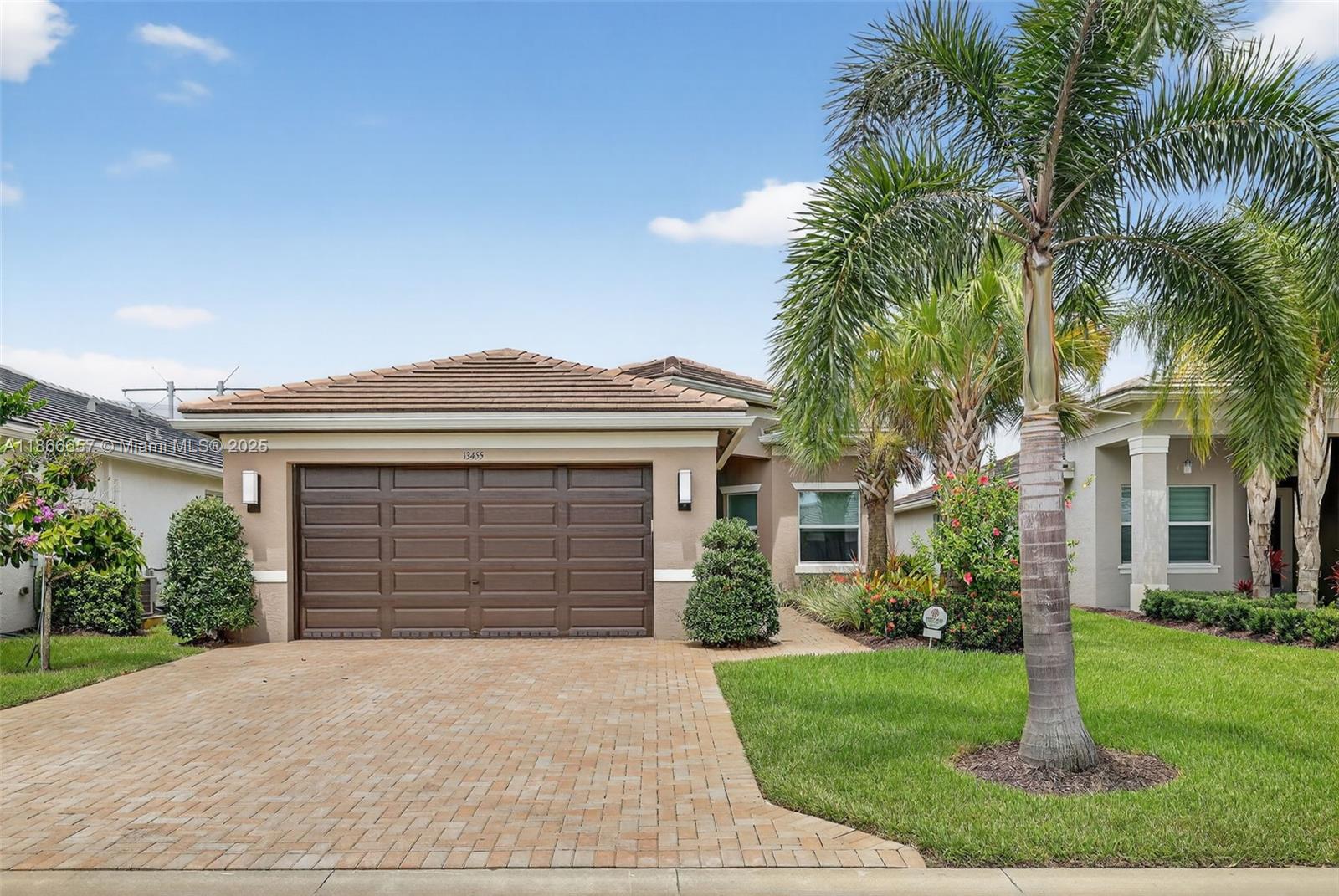 Stunning water view Marsala model filled with natural light! This home features crown molding, custom window treatments, designer wallpaper, and upgraded porcelain tile throughout- no carpet. The bright, white kitchen boasts a built-in pantry and upgraded finishes. Both bathrooms are beautifully enhanced, with decorator-inspired lighting and designer touches carried throughout the living spaces. French doors lead to the office, while large windows frame the serene water view, creating a bright, elegant, and inviting home. Added bonuses include a huge storage room and a versatile flex room. Come tour this gorgeous home and make it yours today! It is time to enjoy the Riverland Lifestyle!