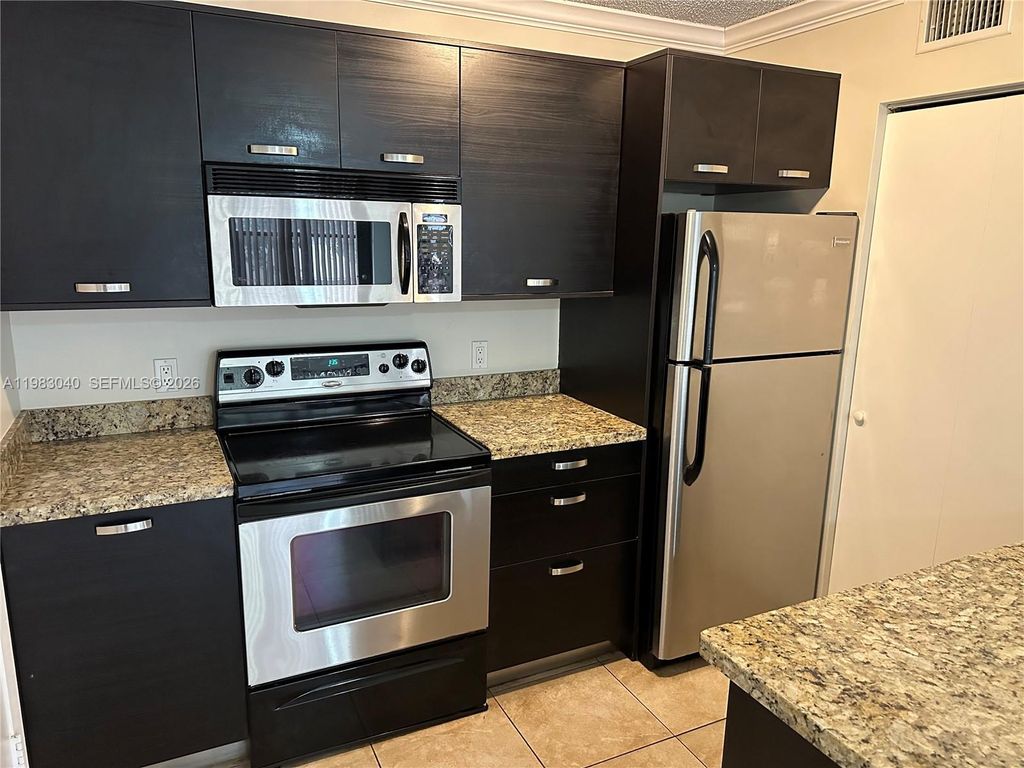 Photo of 4221 W Mcnab Rd #35, Pompano Beach, FL 33069 (MLS # A11983040)