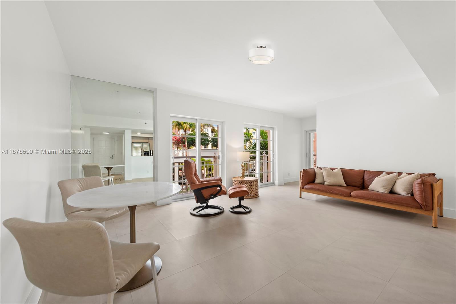 This beautifully remodeled 1-bedroom, 1.5-bathroom plus den condo is a rare find in the sought-after South of Fifth neighborhood. With an open, light-filled layout and two private terraces, it offers a perfect blend of comfort and style. The den is ideal for a home office or guest space, while the spacious master suite opens to a serene patio with lush landscaping. Located just two blocks from the beach and steps from top restaurants, The Courts offers resort-style amenities, including two pools, a fitness center, 24-hour security, storage unit and guest parking.