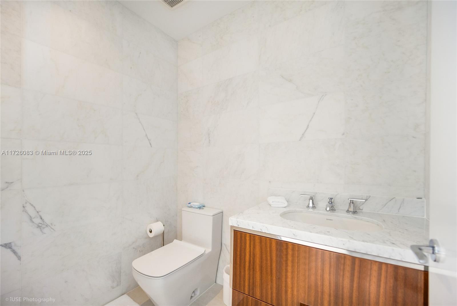 15701 COLLINS CONDO - Residential Lease