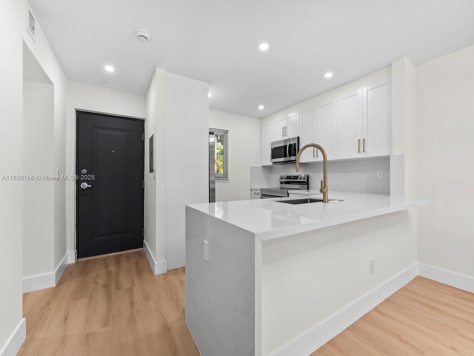 Beautifully renovated with high-end finishes one-bedroom apartment located in the vibrant heart of the Dadeland area. This stylish residence features all brand-new appliances, modern flooring, and an updated bathroom. Designed with an open-concept layout, the unit boasts impact-resistant windows and doors, along with a spacious quartz island that anchors the contemporary kitchen.
Enjoy a wealth of community amenities, including multiple swimming pools, a well-equipped fitness center, tennis and basketball courts, and a welcoming clubhouse. Conveniently situated near major highways, premier shopping destinations, and a variety of dining options.