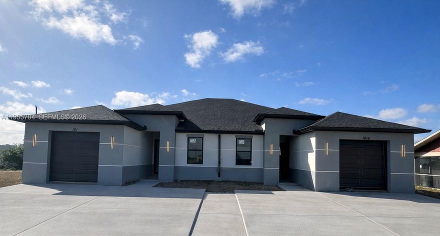 Amazing opportunity to BUILD a DUPLEX BELOW MARKET PRICE! This PRE-CONSTRUCTION Deal is a CASH or HARD MONEY LOAN ONLY, Call Today! BEST PRICED New Duplex in ALL SWFL (3/2 with Garage each Side) Permits are submitted to Cape Coral and under review. Price INCLUDES LAND AND CONSTRUCTION COST with BLUESHINE BUILDER. Featuring IMPACT-RESISTANT windows, HIGH CEILINGS, an OPEN-CONCEPT kitchen with modern cabinets and QUARTZ countertops, stainless steel kitchen appliances, and PORCELAIN tile floors throughout. CITY WATER AND SEWER, NO FLOOD ZONE. SCHEDULED to be COMPLETED in SEPTEMBER 2026 or sooner. Photos are renderings or of similar completed models.