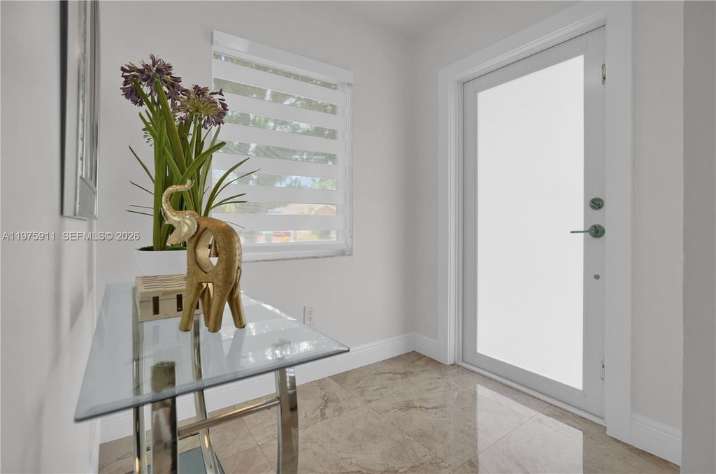 Photo of 14360 SW 156th Ter, Miami, FL 33177 (MLS # A11975911)