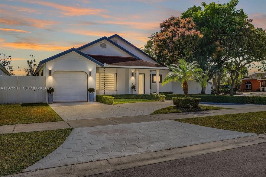 Welcome to this inviting 3 bedroom, 2 bathroom Single Family Home with a one-car garage. Ideally situated on a desirable corner lot in Miami. Featuring porcelain tiled flooring and high ceilings with recessed lighting throughout, this home offers a bright and open feel from the moment you enter. Step into a welcoming foyer that leads to a spacious living room filled with natural light, seamlessly connecting to the dining area and kitchen — perfect for everyday living and gatherings. The well-appointed kitchen boasts stainless steel appliances, quality cabinetry, marble countertops, and a beautiful backsplash that adds a modern touch. The primary bedroom offers a generous closet and an updated bathroom with a roomy shower equipped with both overhead and handheld showerheads for added comfort and convenience.
Step outside to the relaxing backyard with a covered patio — an ideal space for entertaining or quiet outdoor living. There is ample room to add a pool and park a boat, making this outdoor space highly versatile and ready for your lifestyle upgrades. No HOA! Located close to shopping plazas, dining options, and everyday conveniences, this home combines comfort, functionality, and a great location.