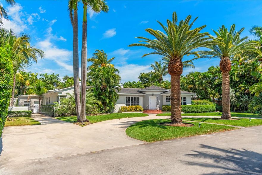 DOUBLE LOT! Centrally located in guard-gated Belle Meade, a trendy Upper East Side neighborhood! This 3,241sqft home with 4 BD/4 BA + office, & a 1 BD/1 BA Guest House w/living room & secondary kitchen sits on an oversized 15,930 SF lot. Huge bedrooms w/ a great split floor-plan flooded w/ natural light. Gourmet gas kitchen, original Florida pinewood floors, renovated bathrooms, fireplace, huge fenced-backyard w/ fire-pit, expansive front yard, & semicircular driveway with plenty of parking! This gated family friendly neighborhood offers a park & kids playground for residents, & is easily accessible to dining/shopping in the DESIGN DISTRICT, WYNWOOD, & BAL HARBOR SHOPS. Mins to MIAMI SHORES COUNTRY CLUB, & NORMANDY SHORES COUNTRY CLUB. Easy access to major highways, MIA Airport & beaches.