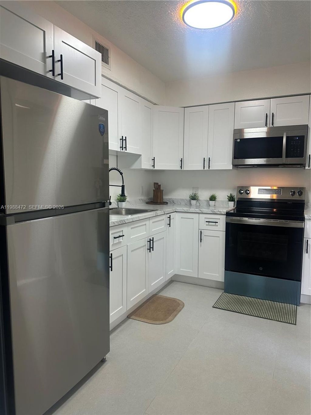 Photo of 500 NW 24th Ave #29, Fort Lauderdale, FL 33311 (MLS # A11988472)