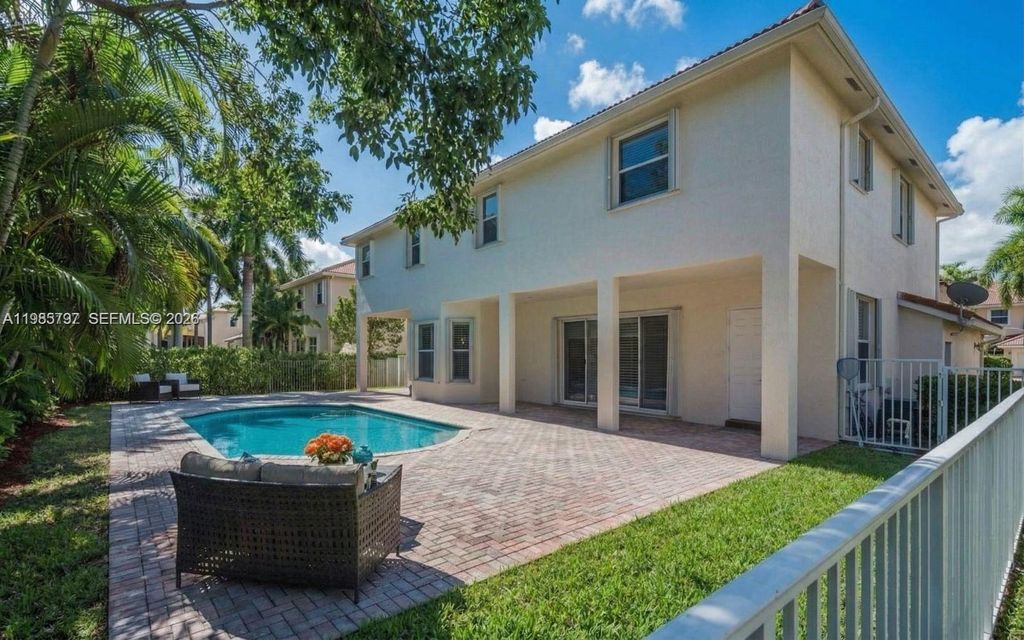 Photo of 1633 Victoria Pointe Ln, Weston, FL 33327 (MLS # A11985797)