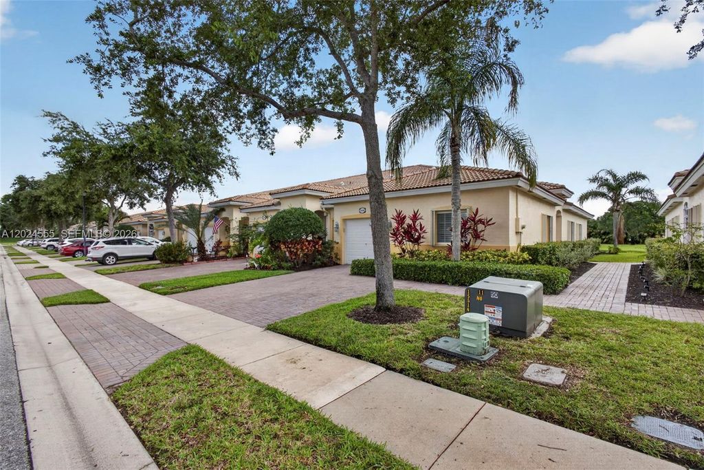 Photo of 2368 Windjammer Way, West Palm Beach, FL 33411 (MLS # A12024555)