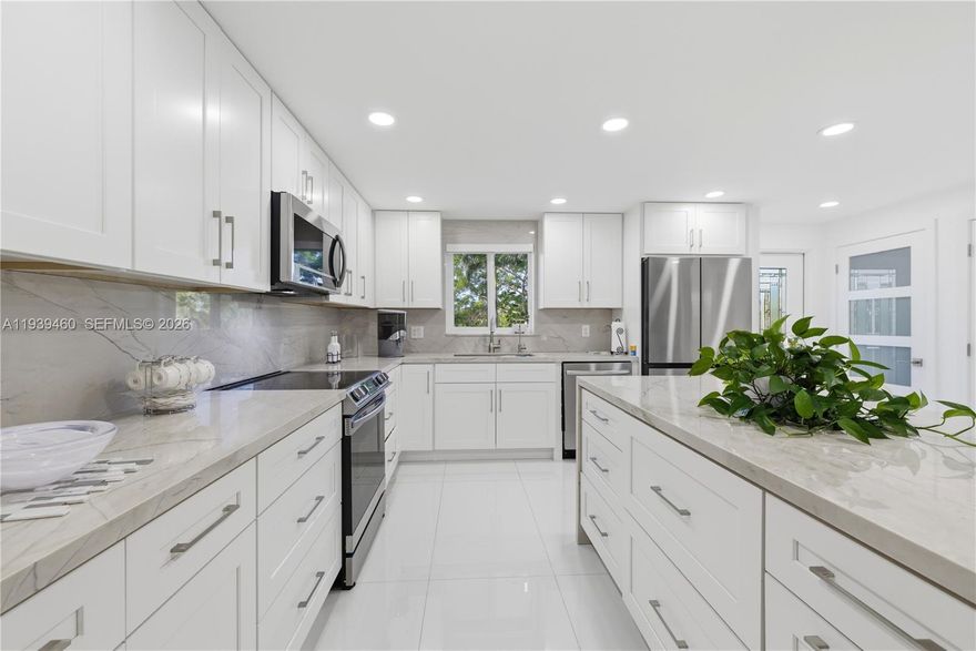 Completely renovated, turnkey lakefront 2 bed / 2 bath condo in the highly desirable Hollybrook Golf & Tennis Club, a gated 55+ resort-style community in Pembroke Pines. This exceptional residence stands apart as one of the most upgraded units in the entire community, featuring an estimated $100,000 in top-to-bottom renovations and offering nearly 1,500 sq ft of spacious living one of the larger floor plans in Hollybrook.

Designed with a modern open-concept layout, the unit offers a fully reimagined kitchen with natural stone countertops, high-end finishes, and contemporary technology throughout. Every detail has been thoughtfully selected to deliver a sleek, elegant, and functional living space, nothing original remains.

Enjoy tranquil lake views from a building ideally located in a secluded, low-traffic area of the community, providing added privacy and peace. This is true turnkey living: simply bring your suitcase and start enjoying the lifestyle.

Hollybrook offers bundled golf, multiple pools, tennis and pickleball courts, clubhouse, fitness center, social activities, and 24/7 security. Rentals are permitted after 9 months of ownership. Paid-Up Recreation Lease, an important value in this community.