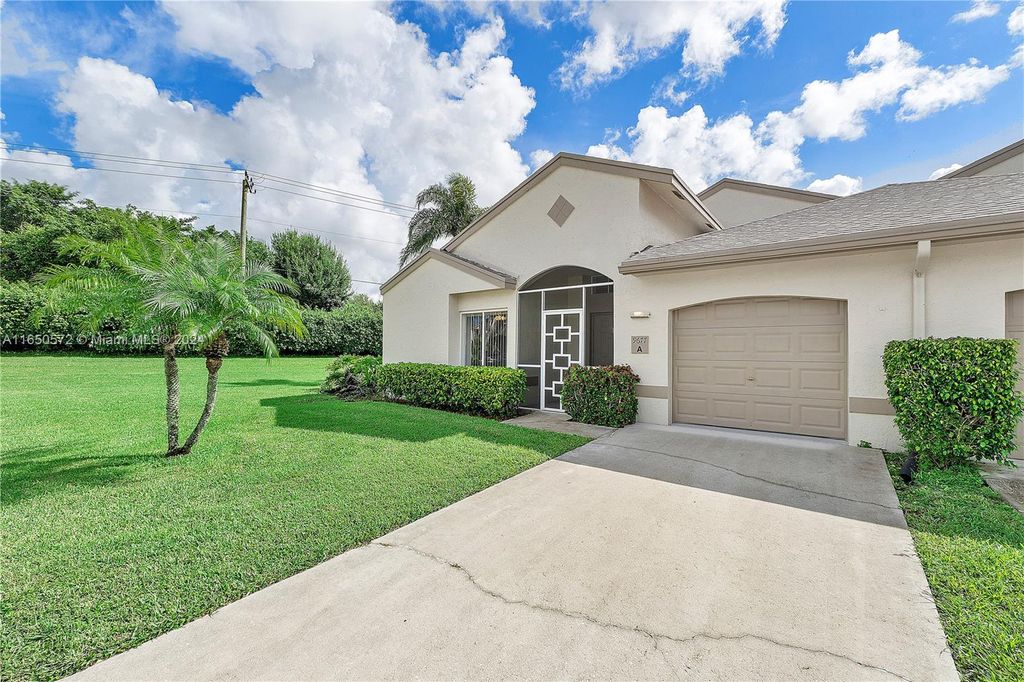 Photo of 9677 N Boca Gardens Cir N #A, Boca Raton, FL 33496 (MLS # A11650572)