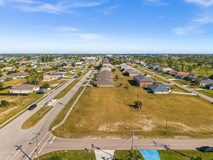 1422 Trafalgar Pkwy. An Amazing opportunity to own a 3-lot site on Trafalgar Parkway at SW 15th Avenue in desirable Southwest Cape Coral. These three side-by-side parcels (1414, 1418, and 1422 Trafalgar Pkwy) sit on a medium-to-high traffic corridor with great visibility, sidewalks in place, and an existing neighborhood of single-family and multifamily homes nearby. City water and sewer are already on site, and public records show zoning intended for multifamily/duplex residential use (buyer to verify zoning and permitted uses with the City of Cape Coral). The seller will not sell the middle lot (1418) by itself, but will consider offers that combine 1418 with 1414, 1422, or both. This flexible set-up gives you options for a duplex, small multifamily project, or future investment hold in a growing area with easy access to schools, shopping, and major roads.