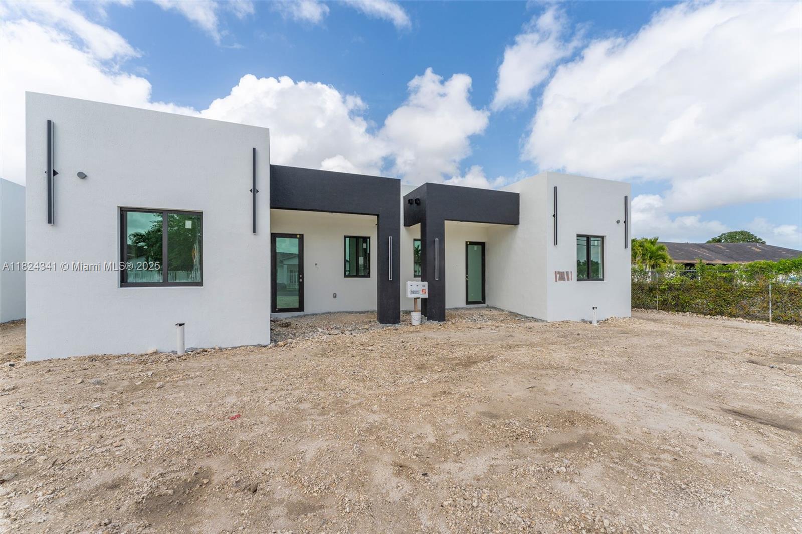 DON'T MISS OUT ON ALL THESE BRAND-NEW MODERN ONE STORY 3BED 2BATH TWIN HOMES, ALL WITH VERY SPACIOUS YARDS. THIS PROPERTY FEATURES PORCELAIN FLOORS THROUGHOUT THE ENTIRE HOME, SPACIOUS LIVING AREAS, LARGE BEDROOMS, IMPACT WINDOWS AND DOORS, HIGH CIELINGS, 8FT SOLID WOOD DOORS, CONCRETE SQUARE DRIVEWAY, NO CDD, NO HOA. DEVELOPER INCENTIVES BEING OFFERED, PLEASE CALL LISTING AGENTS FOR MORE DETAILS ON ALL DIFFERENT TWIN HOMES. HURRY THESE WILL NOT LAST!!