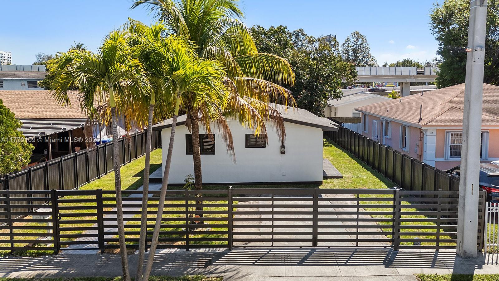 Move-In ready 4- bedroom, 2-bathroom single family home zone Duplex. Flexible layout with TWO SEPARATE entrances. Fully fenced. Opportunity for a family to live in a 3/1 and rent out the private studio (ARBNB/long-term) or for an investor looking to convert it to a 3/1 + 1/1 to get advantage of the high rentals demand in the area. Located next to SR 112 Airport Expressway, Miami International Airport, Hialeah and Doral. Bike to the Miami Design District. Walk to Earlington Heights station only 7 stops away from Brickell City Center & Vizcaya Museum & Gardens in famous Coconut Grove South Miami Ave. Drive 3 miles away either taking NW 17th Ave or NW 12th Ave and you'll be in Domino Park in the famous 8th Street in Little Havana.