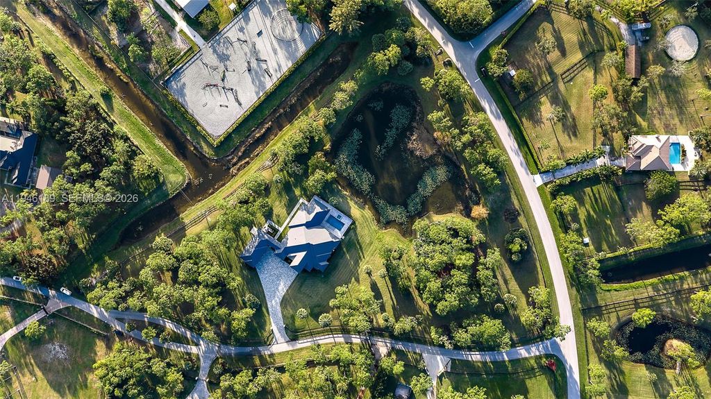 Photo of 14527 Pepper Bush Dr, Palm Beach Gardens, FL 33418 (MLS # A11946189)