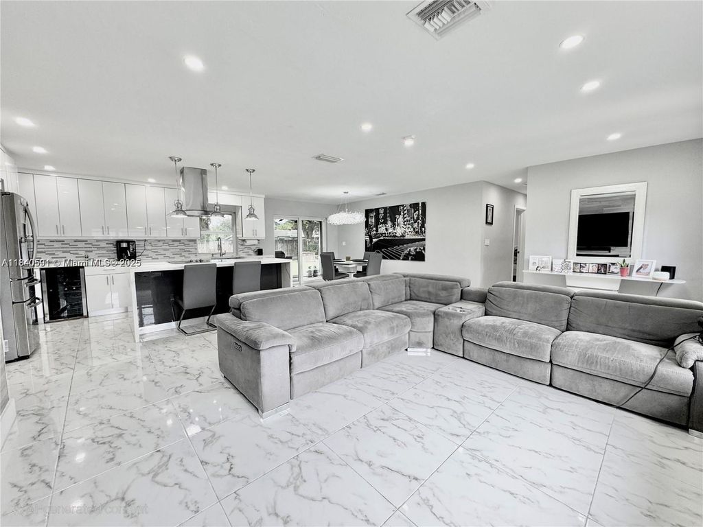 Photo of 161 NW 46th Ter, Plantation, FL 33317 (MLS # A11840591)