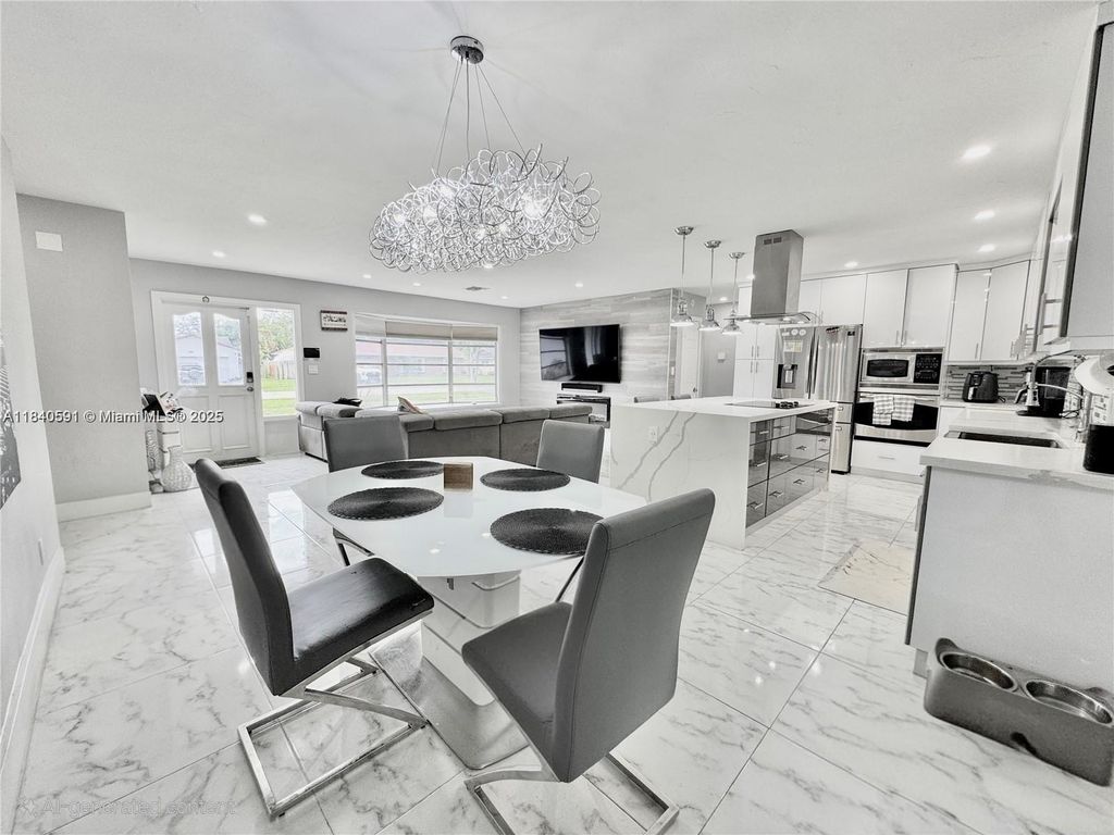 Photo of 161 NW 46th Ter, Plantation, FL 33317 (MLS # A11840591)