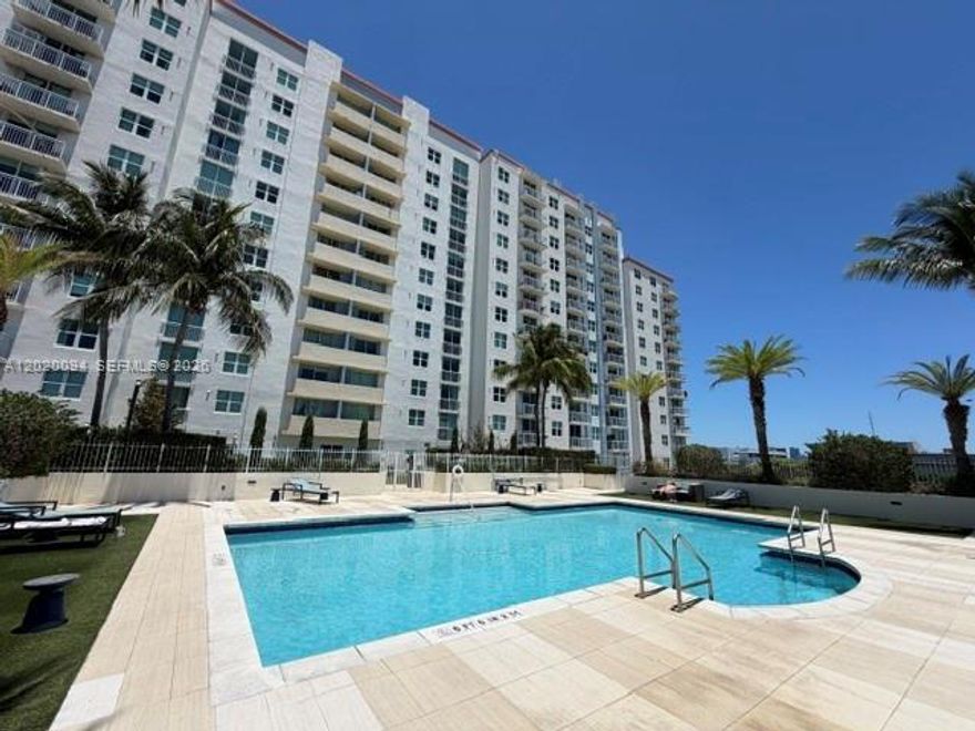 A Perfect 10! One bedroom condo on high floor in the popular Aston Building with spectacular views of The Miami Skyline, the city of Coral Gables, and other notable places. Remodeled with neutral travertine flooring in living area (carpet in bedroom). Kitchen is open to living/dining wih large breakfast counter, recent refrigerator, range, microwave and dishwasher. Washer/dryer inside unit. Bathroom renovated with marble. Blackout shade in bedroom. This unit is vacant and ready for immediate occupancy, there is no approval for a Buyer. Building allows rentals, min. of 6 months. Water, internet and pest control is included in the monthly fee. Sparkling swimming pool and excercise room located on the 4th floor. Guest parking.  Friendly concierge, callbox or fob will give you access to building.