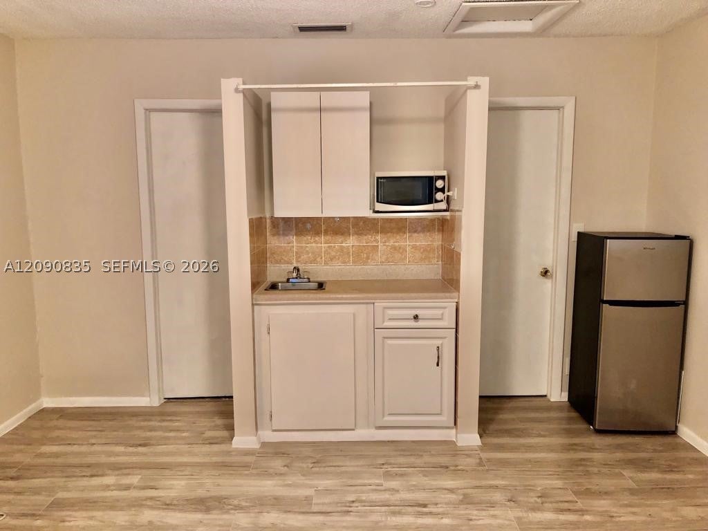 Photo of 4610 SW 43rd Ter, Dania Beach, FL 33314 (MLS # A12090835)