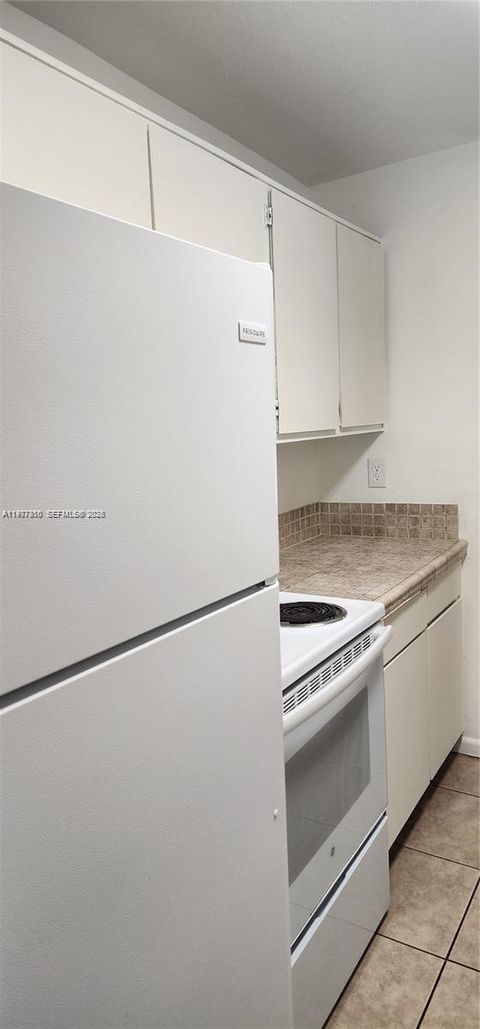 Tiny photo for 3948 NW 87th Ave #3948, Sunrise, FL 33351 (MLS # A11977810)