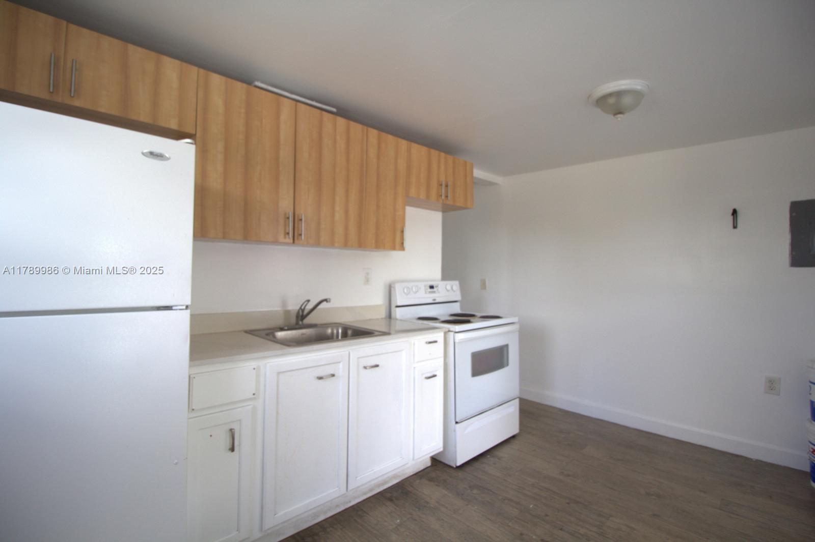 Spacious 2-bedroom, 1-bath unit located on a high-traffic avenue just minutes from I-95. Prime location surrounded by shopping centers, supermarkets, and restaurants. This property sits in a rapidly growing area with high rental demand. Water and trash included. Quick approval process and easy to show. Don't miss this opportunity!
