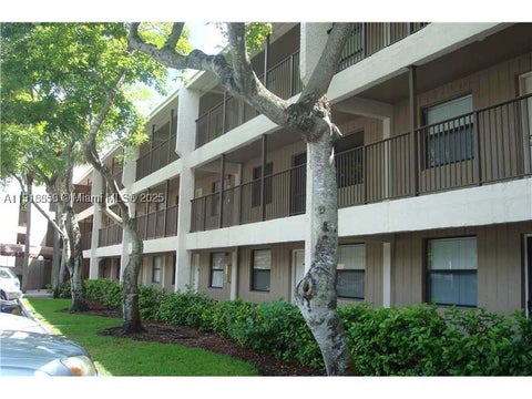 Photo of 8715 Shadow Wood Blvd #211, Coral Springs, FL 33071 (MLS # A11918858)