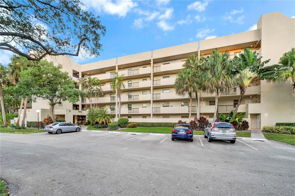 Photo of 3050 NW 42nd Ave #C406, Coconut Creek, FL 33066 (MLS # A12012625)