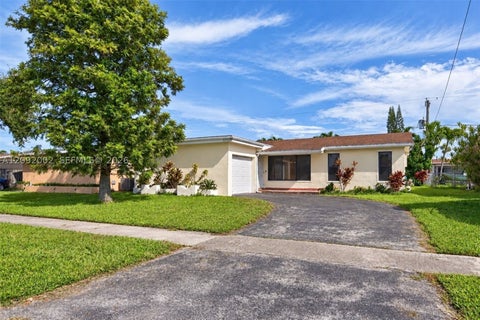 Photo of 11731 NW 30th Pl, Sunrise, FL 33323 (MLS # A12092002)