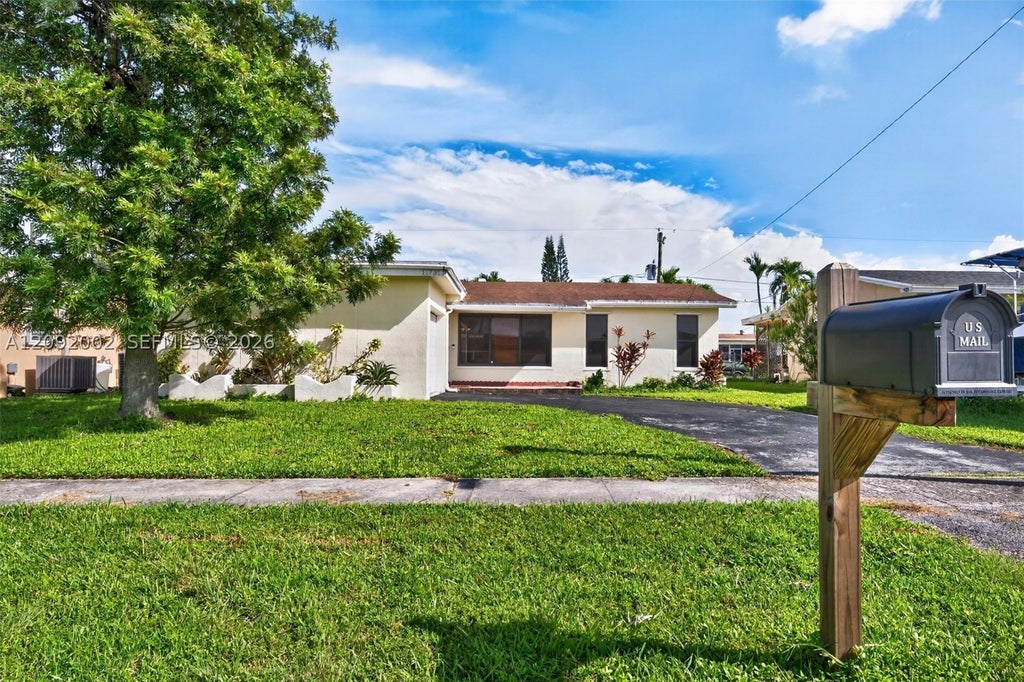 Photo of 11731 NW 30th Pl, Sunrise, FL 33323 (MLS # A12092002)