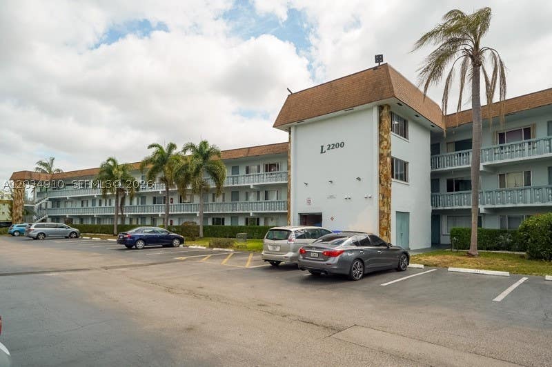 Photo of 2200 Springdale Blvd #214, Palm Springs, FL 33461 (MLS # A12034910)