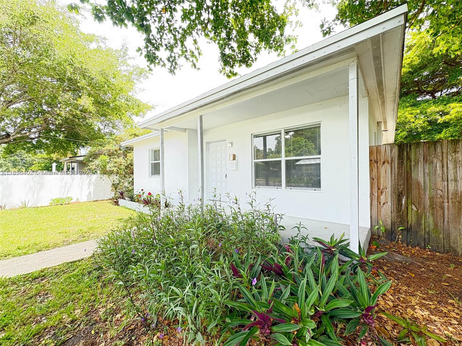 This charming two-bedroom, one-bathroom home in Hallandale Beach features tile flooring throughout and a beautifully updated kitchen with modern wooden cabinets, quality appliances, and a convenient laundry room with a washer and dryer. Enjoy the comfort of central A/C, freshly painted interiors, and a spotless presentation ready for move-in. The spacious backyard is perfect for gatherings with friends and family. Ideally located just minutes from Aventura Mall, a wide variety of dining and shopping options, and with easy access to public transportation. For pets, a non-refundable deposit of $300 will be required. Dogs can weigh up to 20 pounds. Before moving in, the landlord requires mandatory renter's insurance, a one-month rent payment, and two security deposits.