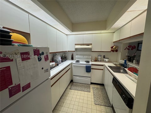 Photo of 12950 SW 7th Ct #210A, Pembroke Pines, FL 33027 (MLS # A12031707)