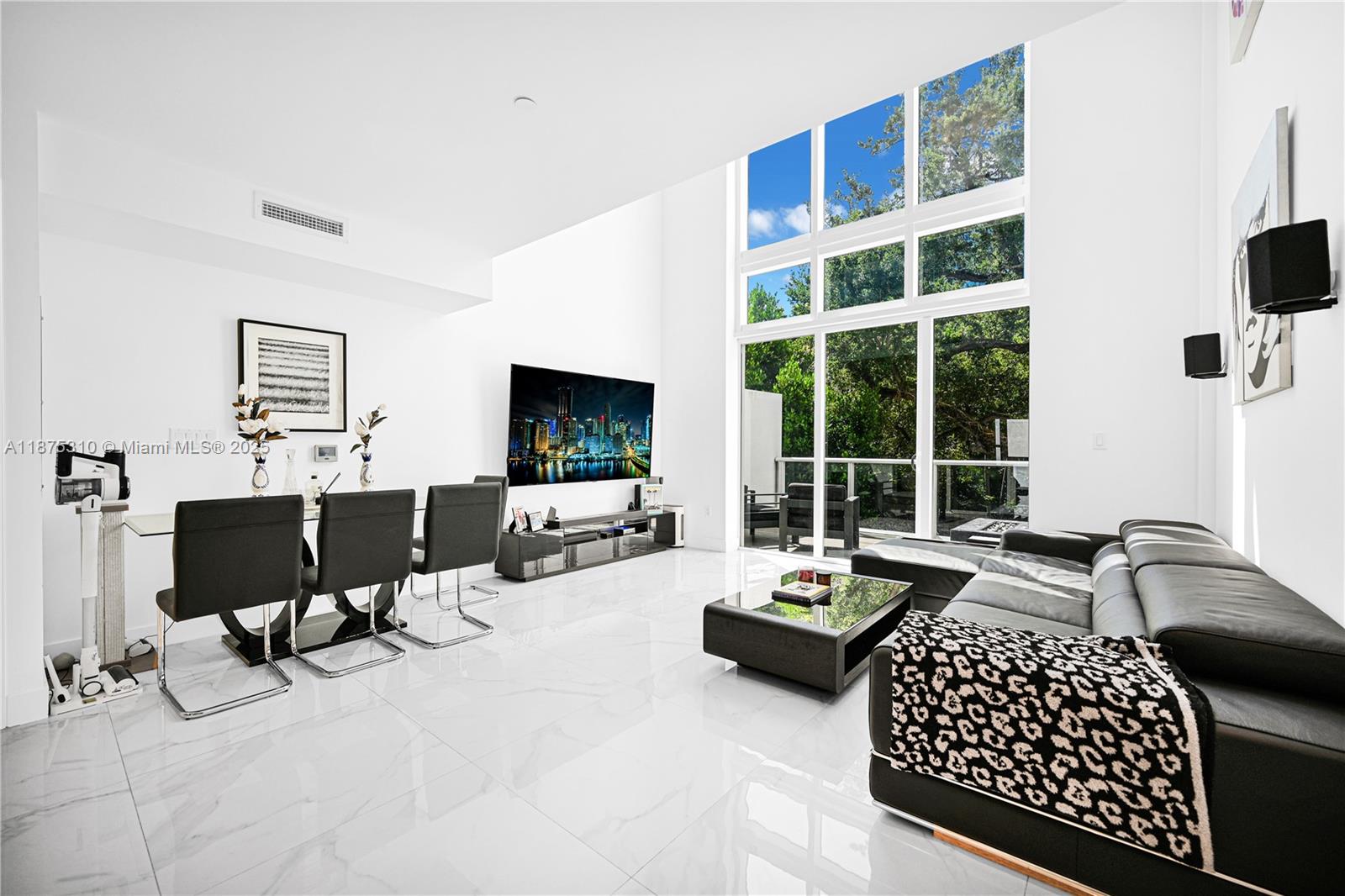 Step into a lifestyle of effortless sophistication where light-filled interiors open to expansive terraces designed for relaxation and entertaining. Clean architectural lines and thoughtful details create a sense of modern elegance, from the sleek chef’s kitchen to spa-quality bathrooms. Tucked within an intimate boutique building, this residence offers both privacy and exclusivity while being surrounded by the vibrant art, culture, dining, and fashion that make Miami’s Design District one of the city’s most desirable destinations.