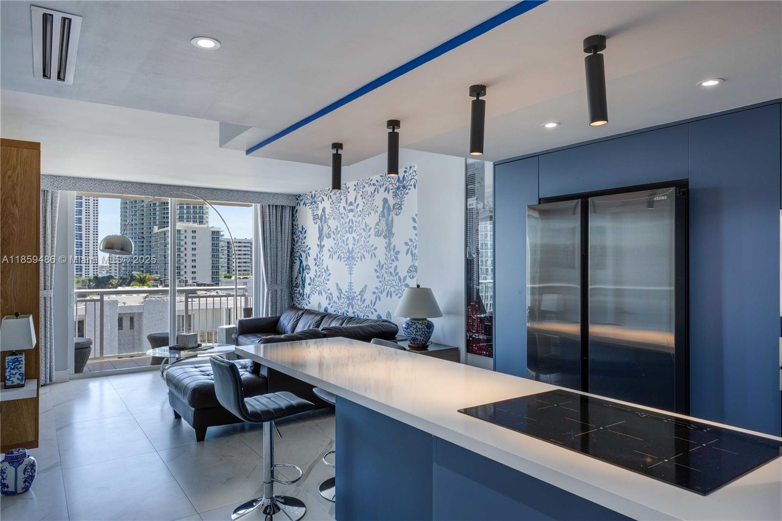 Gorgeous, fully renovated flat situated on the iconic Lincoln Road. This turnkey residence features designer touches throughout, including notes of blue, Ralph Lauren drapes, French wallpaper, and custom-made wooden closets. Offered fully furnished, with a private south-facing balcony showcasing Miami Beach skyline views and glimpses of the bay. Unbeatable central location near Trader Joe’s, Whole Foods, Sunset Harbour, dining, shopping, and fitness studios. Easily accessible to everything Miami Beach living has to offer. Available for immediate occupancy. Residence has only been owner occupied thus far, and is meticulously maintained.