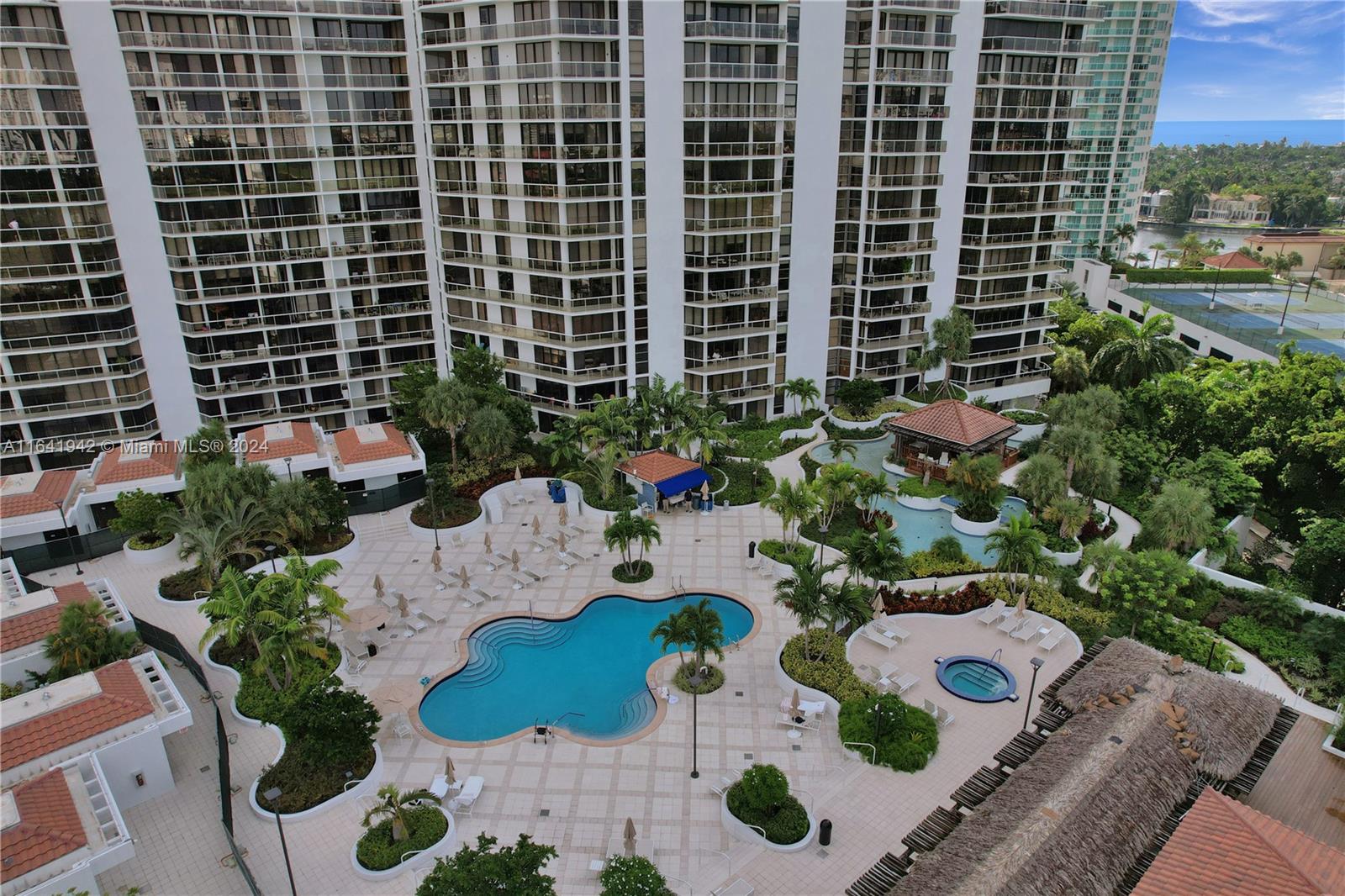 3 bedrooms, 2.5 baths lanai apartment with direct pool access. 2080 Sq. Ft. Located on prestigious Country Club Drive in the heart of Aventura. Floor to ceiling windows and an oversize patio. This is a great apartment. Walk to stores and restaurants. Only 5 minutes to the beach. 3.5-mile bike and walking path across from the property. On-site restaurant, movie theater, fitness center & spa, tennis courts, racquetball courts, party rooms, kids' playroom, nail salon, billiard room, sauna. High speed Internet & cable, pest control, hot & cold water included in the condo fee. Storage unit. One assigned covered parking & additional car valet. Large walk-in closet in master. Baths and kitchen have been updated.
