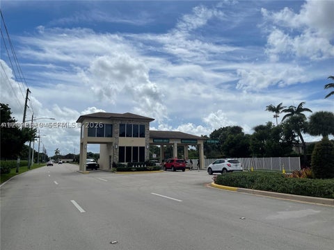 Photo of 800 SW 142nd Ave #104N, Pembroke Pines, FL 33027 (MLS # A12098510)