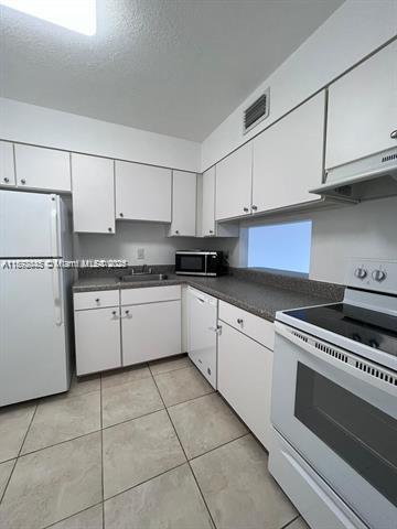 DORAL GARDENS II CONDO - Residential Lease