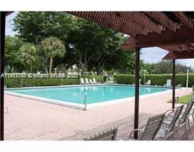 2/2 condo overlooking breathtaking view of lake and golf course. Eat in Kitchen, laminate waterproof floors Walk to Pool. Conveniently located near top shopping and restaurants.