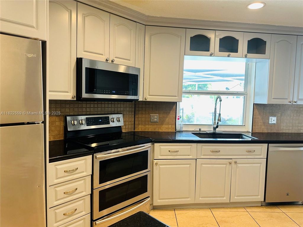 Photo of 3850 NW 81st Ter #3850, Coral Springs, FL 33065 (MLS # A11822559)